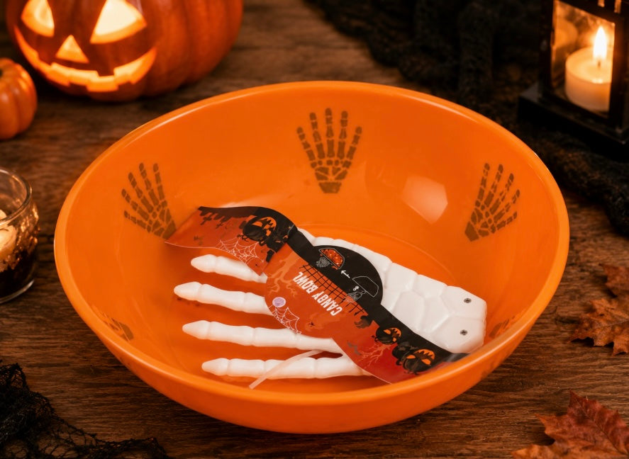 Bol à bonbons Halloween avec main squelette - 2 couleurs